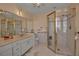 Bathroom features a large shower, double vanity, and updated fixtures at 4805 61St Avenue W Ter, Bradenton, FL 34210