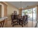 Formal dining room with large windows and chandelier at 4805 61St Avenue W Ter, Bradenton, FL 34210