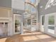 Renovation project with spiral staircase, pool view, and large windows at 4865 Featherbed Ln, Sarasota, FL 34242
