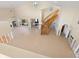 High-ceiling living area with spiral staircase needs renovation at 4865 Featherbed Ln, Sarasota, FL 34242