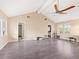 Spacious living room with vaulted ceiling and hardwood floors at 4865 Featherbed Ln, Sarasota, FL 34242