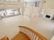 Open concept living area with a spiral staircase and tile floors at 4865 Featherbed Ln, Sarasota, FL 34242