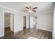 Large bedroom with hardwood floors and walk in closet at 4933 Pebble Beach Ave, Sarasota, FL 34234