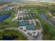 Community tennis courts near clubhouse and parking at 5230 Hyland Hills Ave # 1314, Sarasota, FL 34241