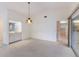 Dining area with wet bar and access to kitchen at 5502 Garden Lakes Oak, Bradenton, FL 34203