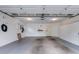 Attached garage with storage cabinets and floor mat at 5502 Garden Lakes Oak, Bradenton, FL 34203