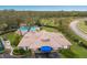 Community clubhouse, pool, and tennis courts at 5502 Garden Lakes Oak, Bradenton, FL 34203