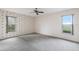 Bedroom with floral wallpaper and neutral carpeting at 5502 Garden Lakes Oak, Bradenton, FL 34203