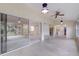 Bright sunroom with tile floors and access to kitchen at 5502 Garden Lakes Oak, Bradenton, FL 34203