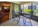 Sunroom with view into living area and backyard access at 6016 28Th W St # 6016, Bradenton, FL 34207
