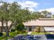 Tan house with carport and landscaping at 6016 28Th W St # 6016, Bradenton, FL 34207