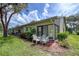 Patio with table and chairs, situated beside the house at 6016 28Th W St # 6016, Bradenton, FL 34207