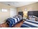 Guest bedroom with two twin beds and nautical bedding at 6016 28Th W St # 6016, Bradenton, FL 34207