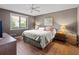 Bright bedroom with king-size bed and wood flooring at 6016 28Th W St # 6016, Bradenton, FL 34207