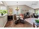Dining area with table, chairs, and chandelier at 6016 28Th W St # 6016, Bradenton, FL 34207