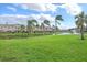 Waterfront community with lush landscaping at 7675 Plantation Cir, University Park, FL 34201