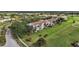 Aerial view of condo building near golf course at 818 Wexford Blvd # 818, Venice, FL 34293