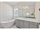 Bathroom with freestanding tub and large mirror at 8332 Sea Glass Ct, Sarasota, FL 34240