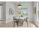 Bright dining area with a view of the pool and outdoor scenery at 8332 Sea Glass Ct, Sarasota, FL 34240