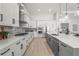 Contemporary kitchen with an island, stainless steel appliances, and sleek cabinetry at 8332 Sea Glass Ct, Sarasota, FL 34240