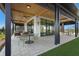 Outdoor patio with a vaulted wood ceiling, a ceiling fan, and comfortable seating area at 8332 Sea Glass Ct, Sarasota, FL 34240