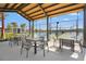 Covered patio area featuring views of the community pickleball courts at 8332 Sea Glass Ct, Sarasota, FL 34240