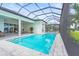 Enjoy Florida living with a private pool, spa, and screened-in lanai overlooking the lake at 8332 Sea Glass Ct, Sarasota, FL 34240