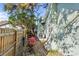 Small backyard with brick path and wooden fence at 1501 14Th W Ave, Bradenton, FL 34205