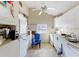 Bright kitchen with white cabinets and vinyl flooring at 1501 14Th W Ave, Bradenton, FL 34205