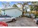 Spacious parking area for several cars with grilling area at 1501 14Th W Ave, Bradenton, FL 34205