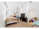 Spacious bedroom with wood floors and fireplace at 1501 14Th W Ave, Bradenton, FL 34205