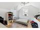 Small bedroom with a double bed and shelves at 1501 14Th W Ave, Bradenton, FL 34205