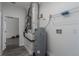 Unfinished mechanical room with water heater and HVAC at 203 16Th W St, Palmetto, FL 34221