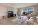 Comfortable living room with access to backyard and water view at 2532 Avolet Ct, Lakewood Ranch, FL 34211