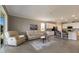 Open living room and kitchen with access to patio and backyard at 2532 Avolet Ct, Lakewood Ranch, FL 34211