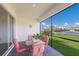 Enjoy the view from this screened porch with patio furniture at 2532 Avolet Ct, Lakewood Ranch, FL 34211