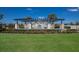Community fountain with pergola and benches, surrounded by lush landscaping at 2532 Avolet Ct, Lakewood Ranch, FL 34211