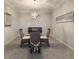 Bright dining room featuring a glass-top table and wicker chairs at 2532 Avolet Ct, Lakewood Ranch, FL 34211