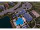 Aerial view of community pool, clubhouse, and tennis courts at 2532 Avolet Ct, Lakewood Ranch, FL 34211