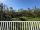 View from balcony of a wooded backyard at 2533 6Th Ave Drive E # 2, Bradenton, FL 34208