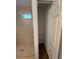 Linen closet and shower with tiled walls at 2533 6Th Ave Drive E # 2, Bradenton, FL 34208