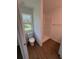 Bathroom with shower, toilet, and wood-look flooring at 2533 6Th Ave Drive E # 2, Bradenton, FL 34208