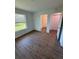 Bedroom with private bath and wood-look floors at 2533 6Th Ave Drive E # 2, Bradenton, FL 34208
