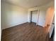 Well-lit bedroom with walk-in closet and wood-look floors at 2533 6Th Ave Drive E # 2, Bradenton, FL 34208