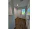 Bright entryway with wood flooring and white walls at 2533 6Th Ave Drive E # 2, Bradenton, FL 34208