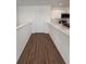 Modern kitchen features white shaker cabinets, quartz countertops, and stainless steel appliances at 2533 6Th Ave Drive E # 2, Bradenton, FL 34208
