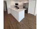 Modern kitchen with white cabinets and stainless steel appliances at 2533 6Th Ave Drive E # 2, Bradenton, FL 34208