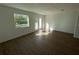 Living room with wood floors and access to balcony at 2533 6Th Ave Drive E # 2, Bradenton, FL 34208