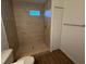 Large tiled shower with built-in shelving at 2533 6Th Ave Drive E # 2, Bradenton, FL 34208