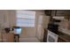 Efficient kitchen with white appliances and wood cabinets at 2808 60Th W Ave # 626, Bradenton, FL 34207